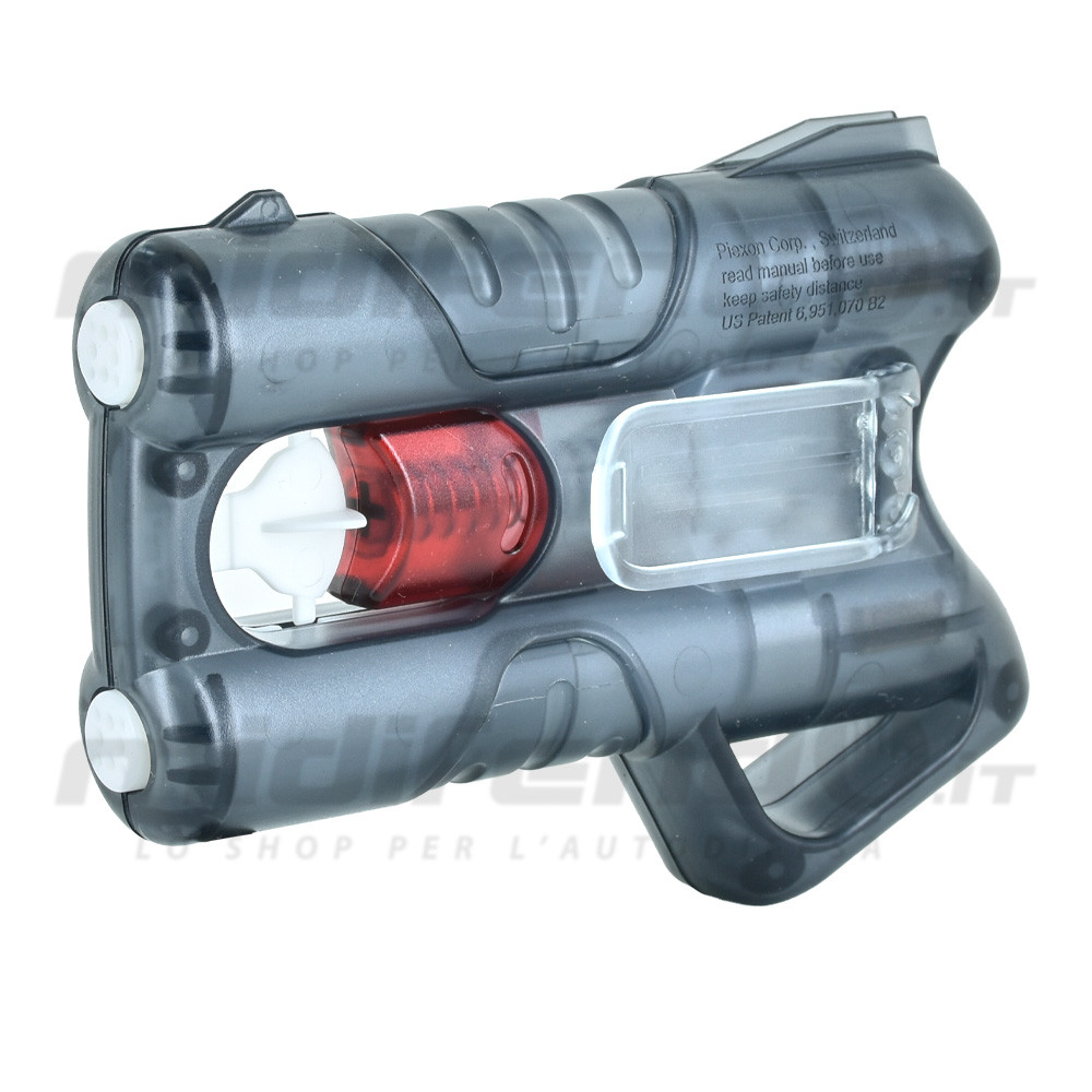 Vista laterale 3/4 pistola spray al peperoncino Piexon con scocca trasparente grigia, cartuccia rossa visibile e sportello trasparente aperto